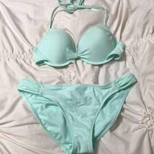 swim suit top is M bottoms are L turquoise